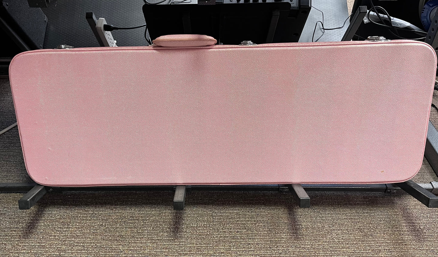 Gator pink hard-shell electric guitar case